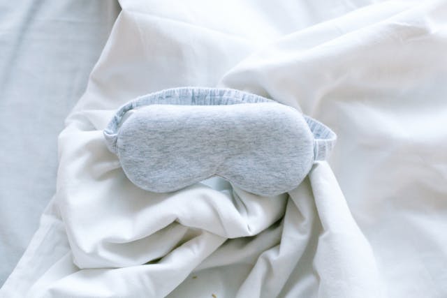 Sleep mask lies on a blanket