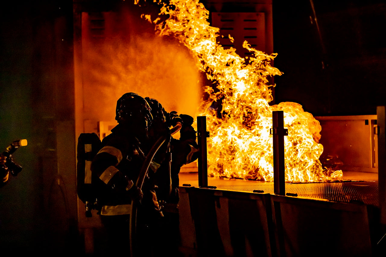 Fireman putting out a fire