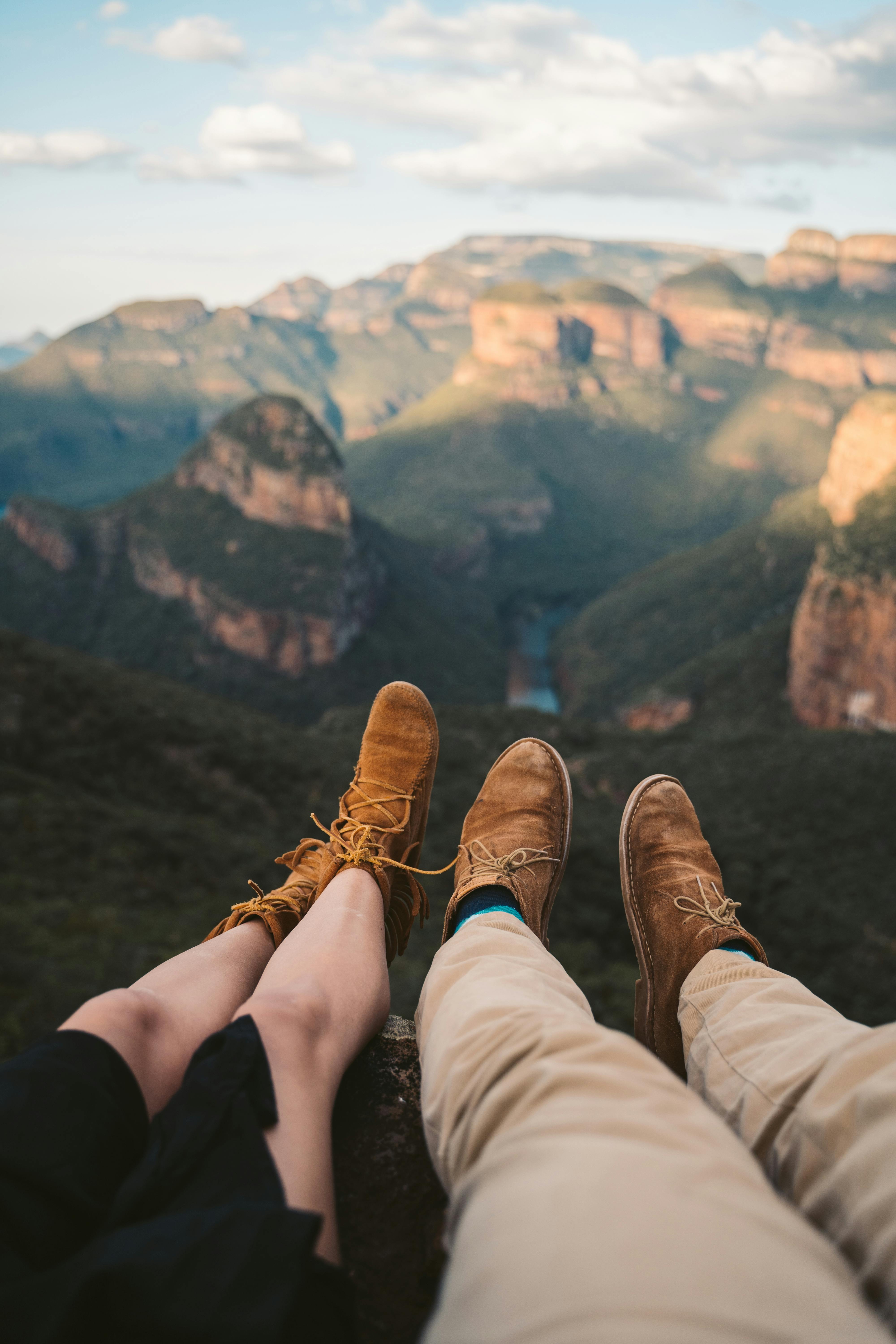  Legs of a man and woman in similar shoes