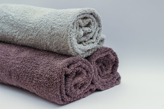 Three rolled towels