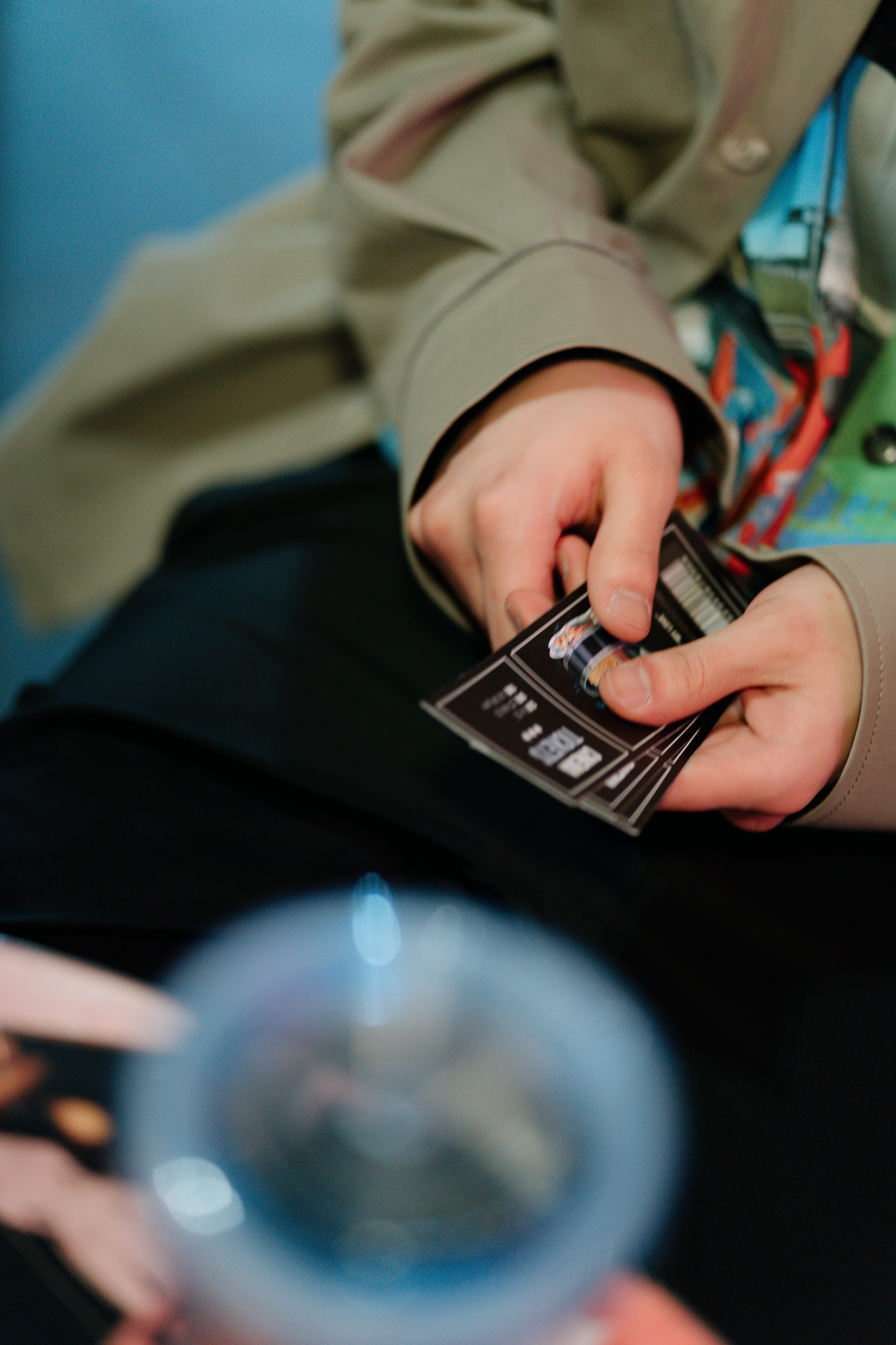 Man holding tickets in his hands