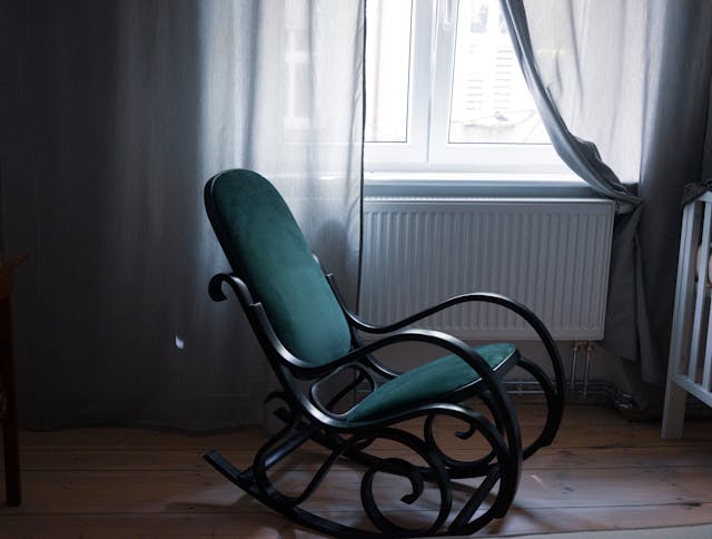 Rocking chair by the window