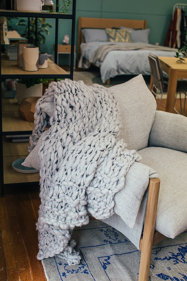 Knitted blanket on an armchair