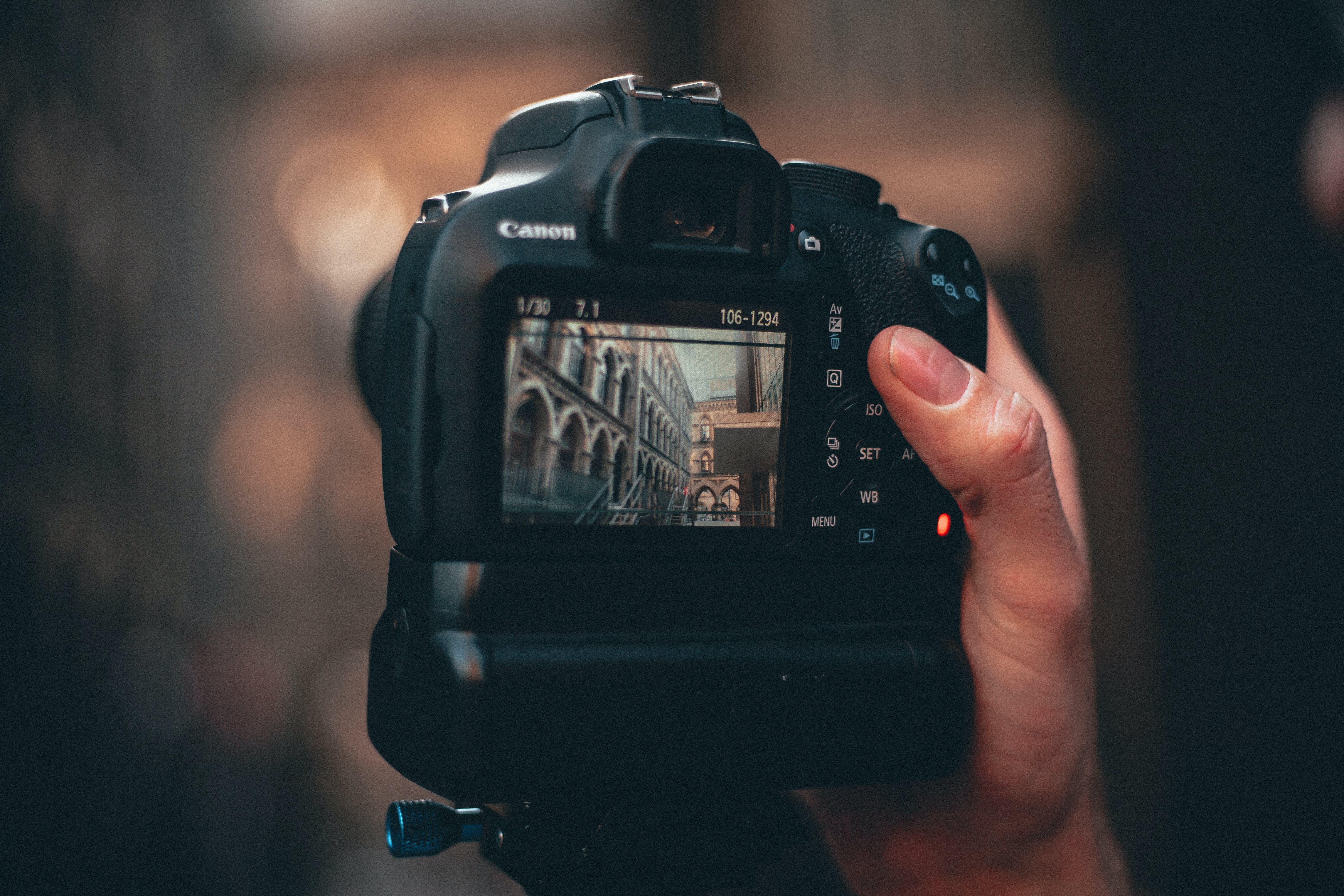 Camera in hand, building on the screen