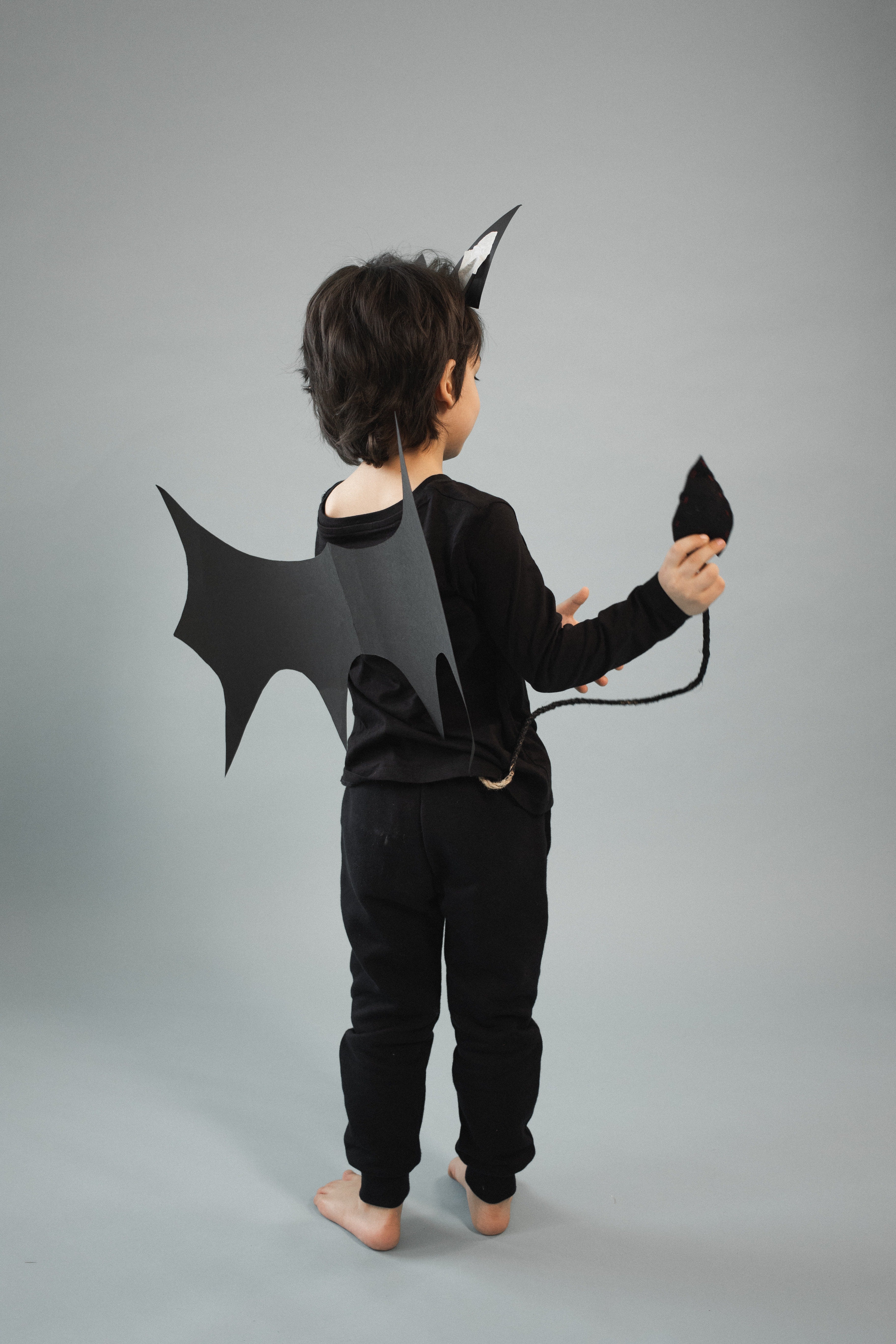 Boy in a bat suit