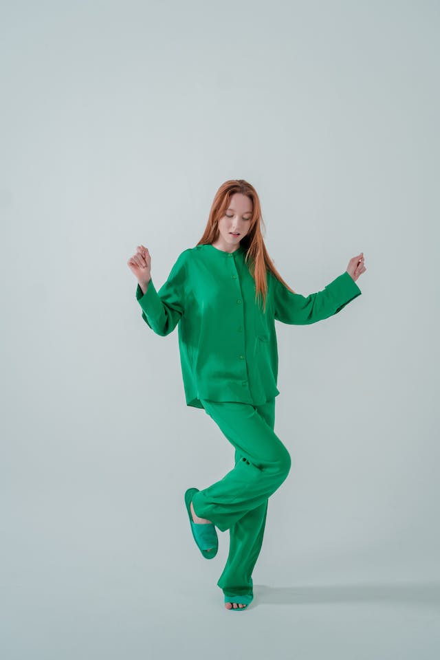 Woman in green pajamas