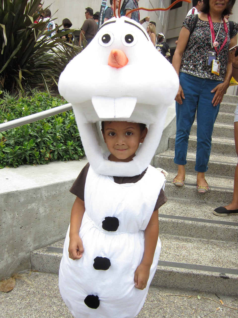 Child dressed in Olaf the snowman costume