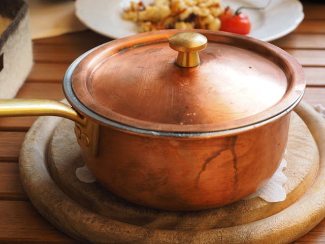 Pan on a wooden stand