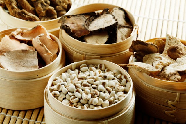 Wooden containers with dried ingredients