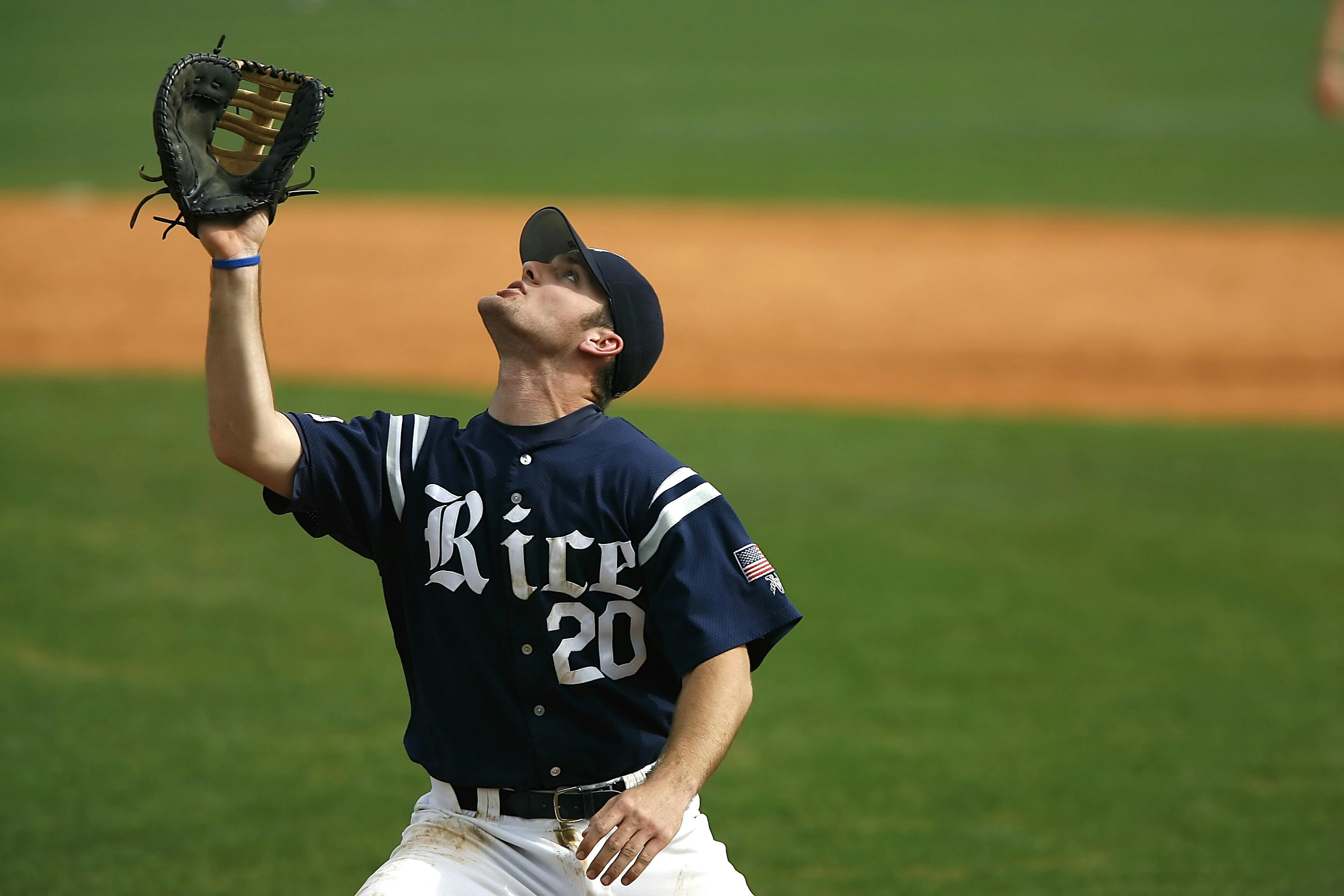 Baseball player preparing to catch the ball