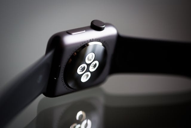 Black smart watch on a gray background