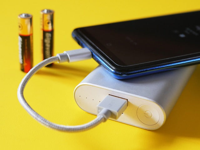 Smartphone connected to power bank
