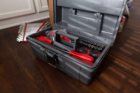 Toolbox on wooden floor