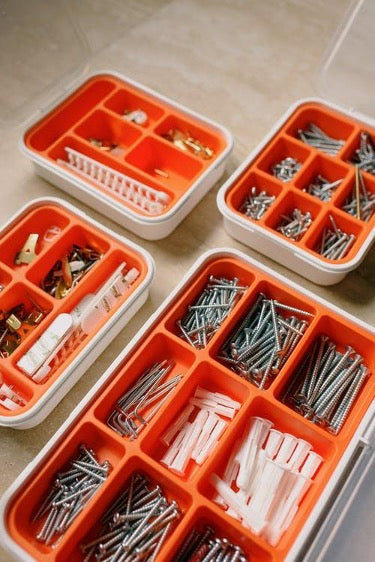 White and orange containers with fasteners