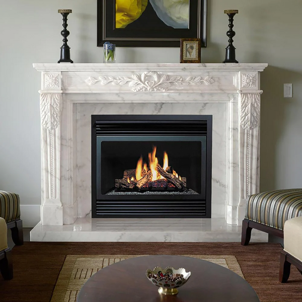 Ornate marble fireplace mantel in living room with dark wood floor.