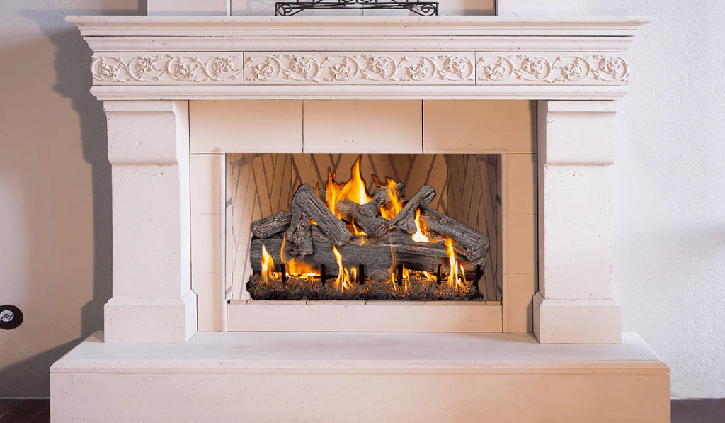 Log insert gas fireplace in a white surround and hearth.