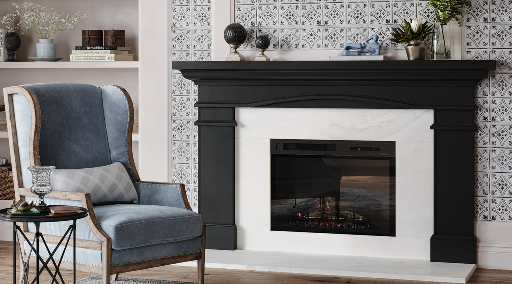 Fireplace with marble surround and black mantel.