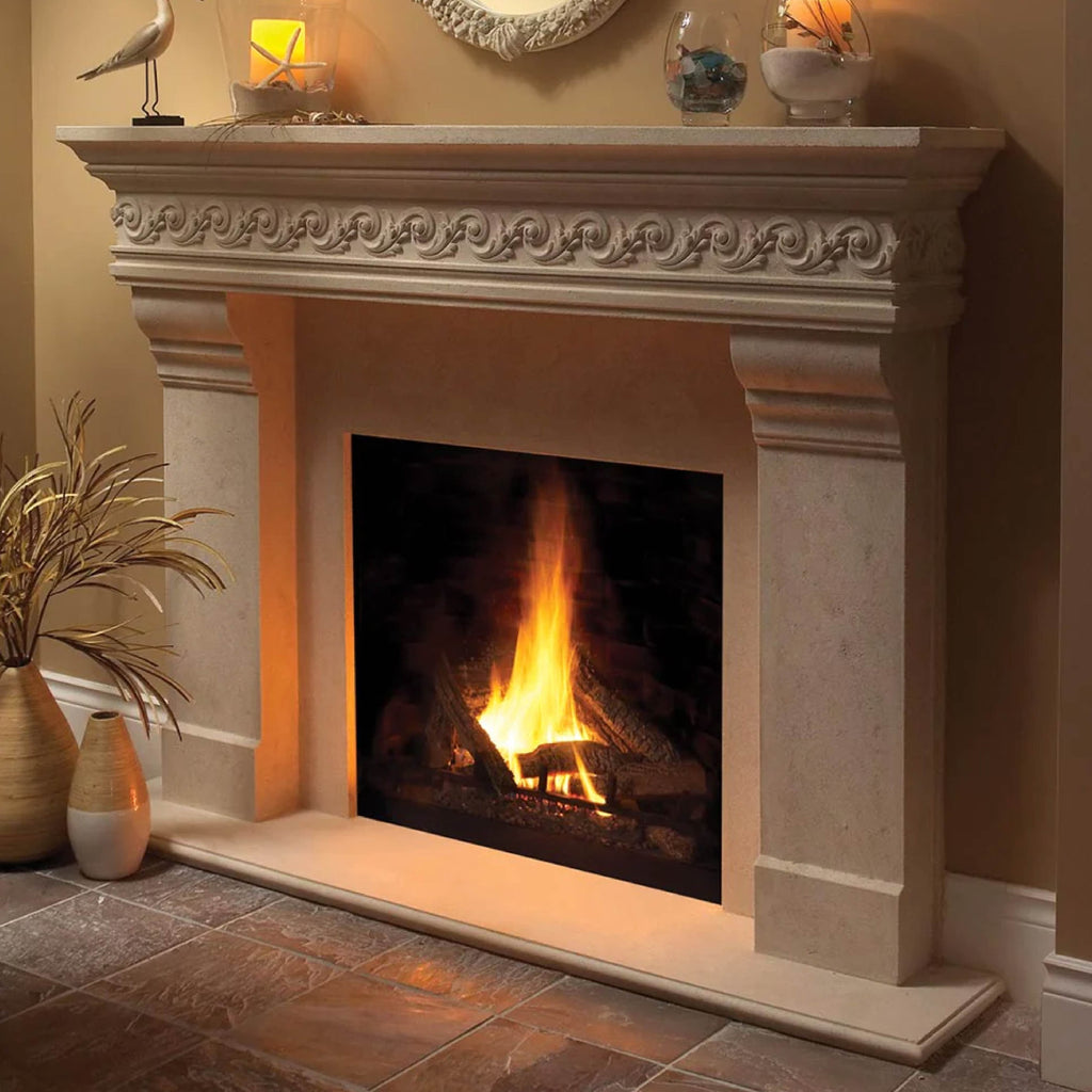 Stately French style cast stone fireplace in warm-toned living room.