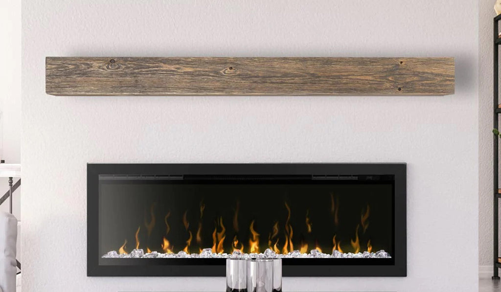 Shabby chic wood mantel over a linear electric fireplace.