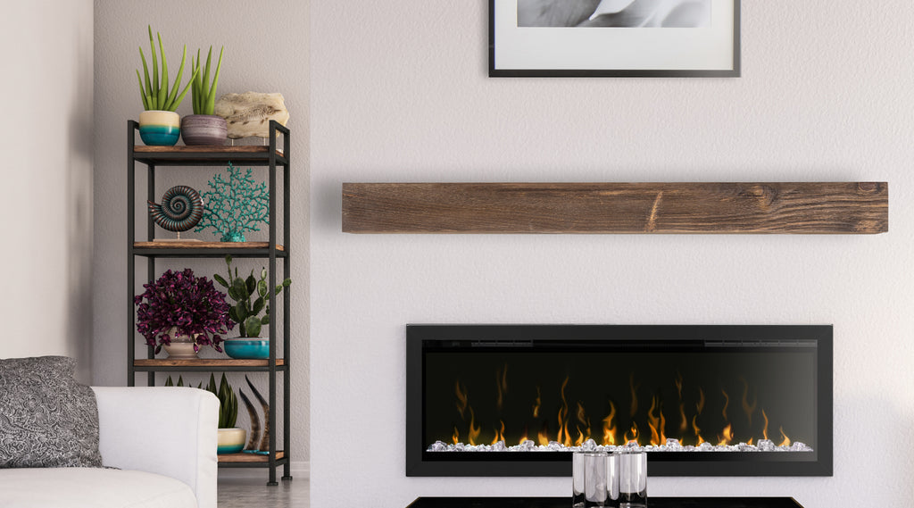 Rustic wood mantel installed over a linear wall mounted fireplace.