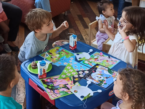 children playing party time bingo at a party