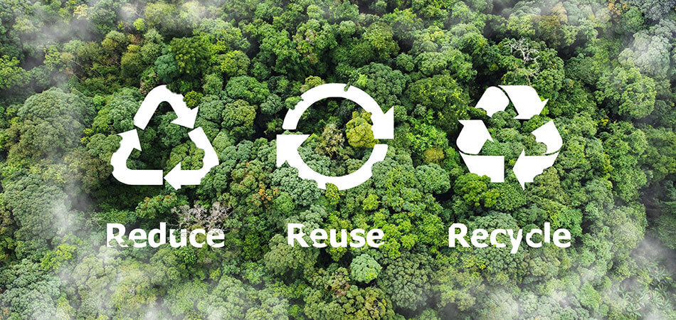 Trees from above with white symbols and text highlighting "reduce, reuse, recycle".