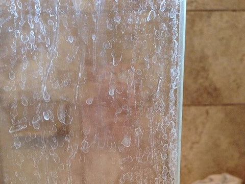 How to Clean a Shower Screen of Soap Scum and Hard Water Deposits