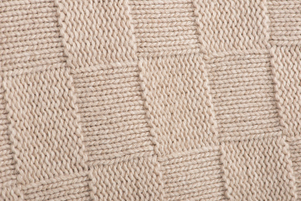 Coperta per lettino in Cashmere lavorata a maglia con motivo a treccia –  cashmerewool