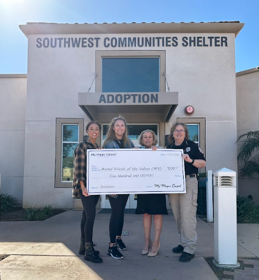 My Magic Carpet Co-Founder presenting a $500 check to Animal Friends of the Valley animal shelter