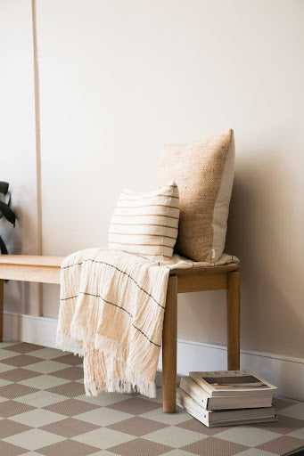 Jute Jaya Checkered Natural Washable Rug 5'x7' in an entryway.