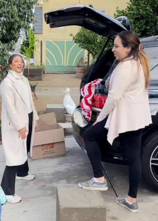 My Magic Carpet's Co-Founder Monica Dally at the Alexandria House in Los Angeles dropping off presents and rugs.