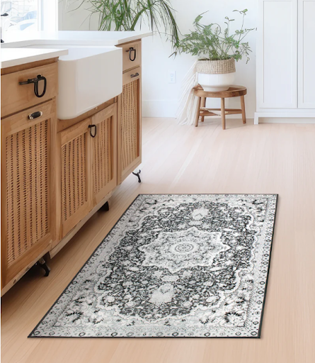 My Magic Carpet's Parviz Grey washable rug on a bathroom floor.