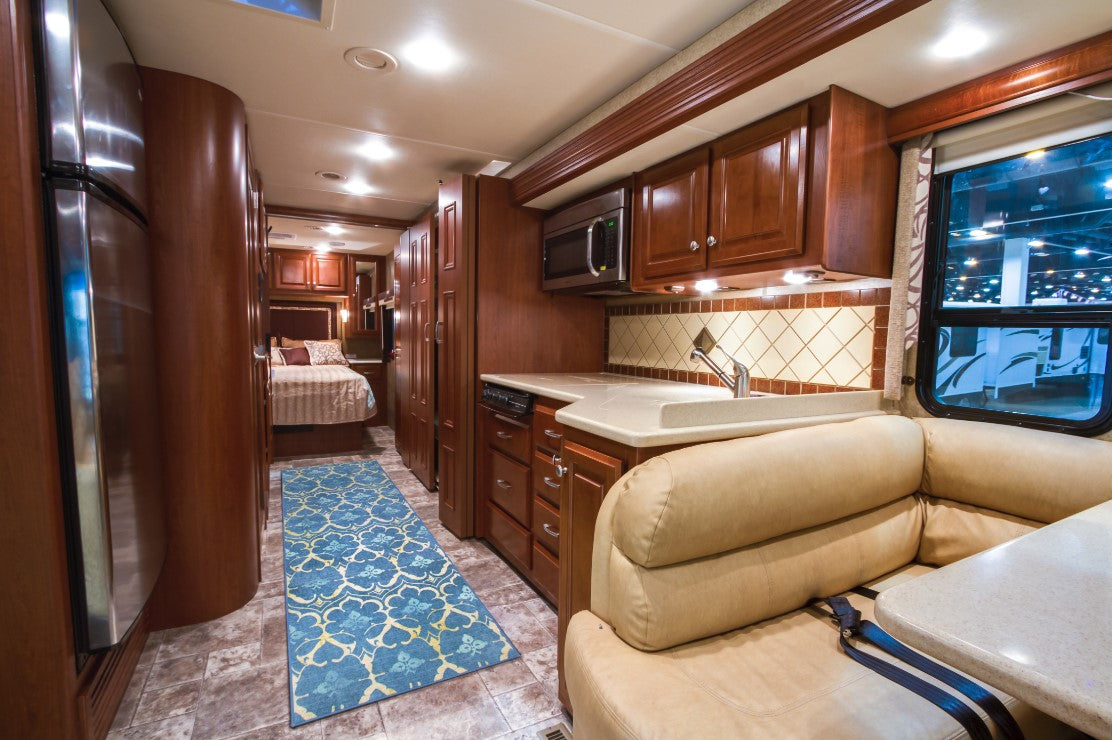 My Magic Carpet's Leilani Damask washable rug on an RV bedroom floor. 