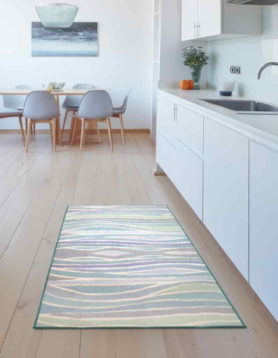 My Magic Carpet's Waves Ocean Blue washable rug on a kitche floor.