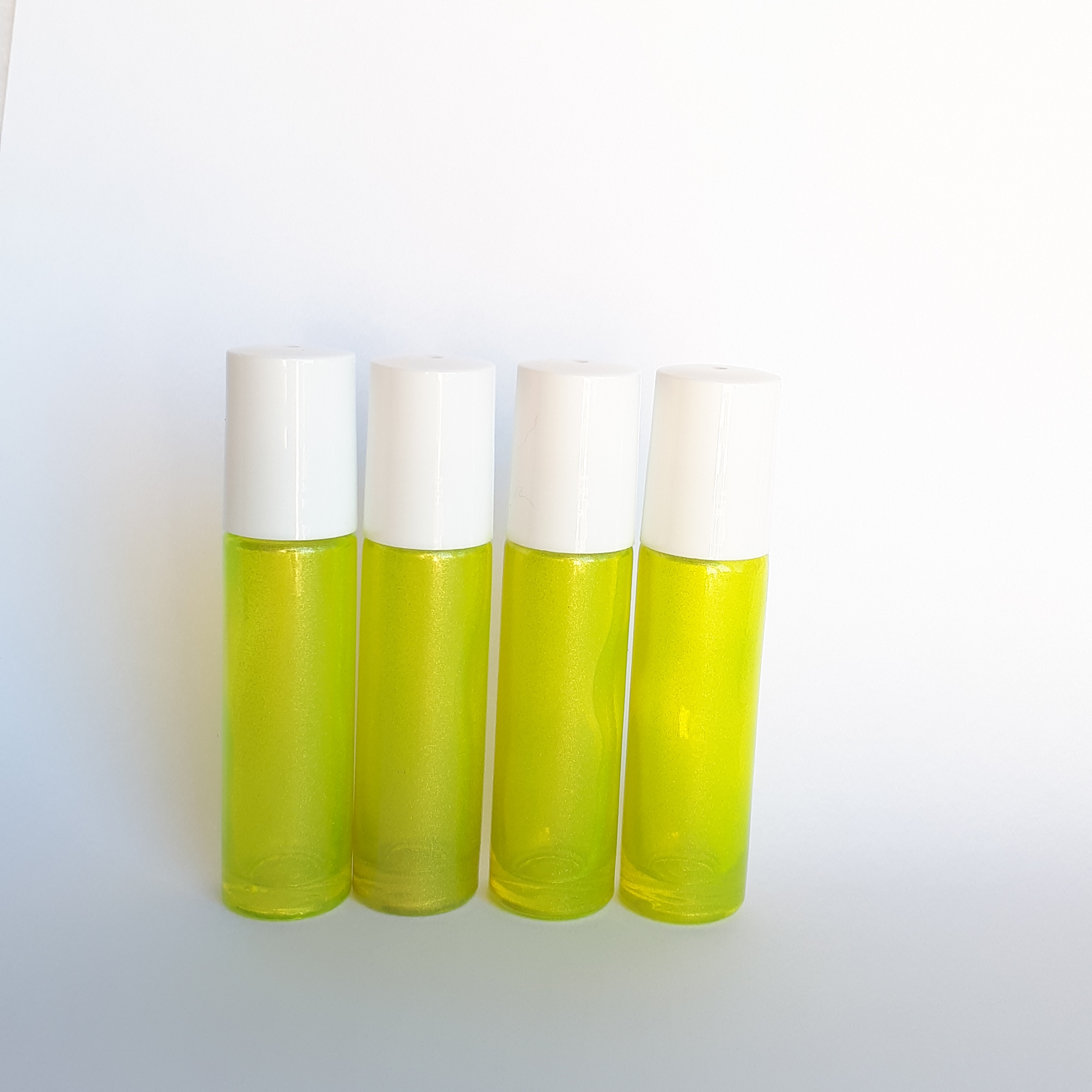 Download 10ml Yellow Roller Bottle With Plastic Roller 4pack Oil Jenneration Yellowimages Mockups