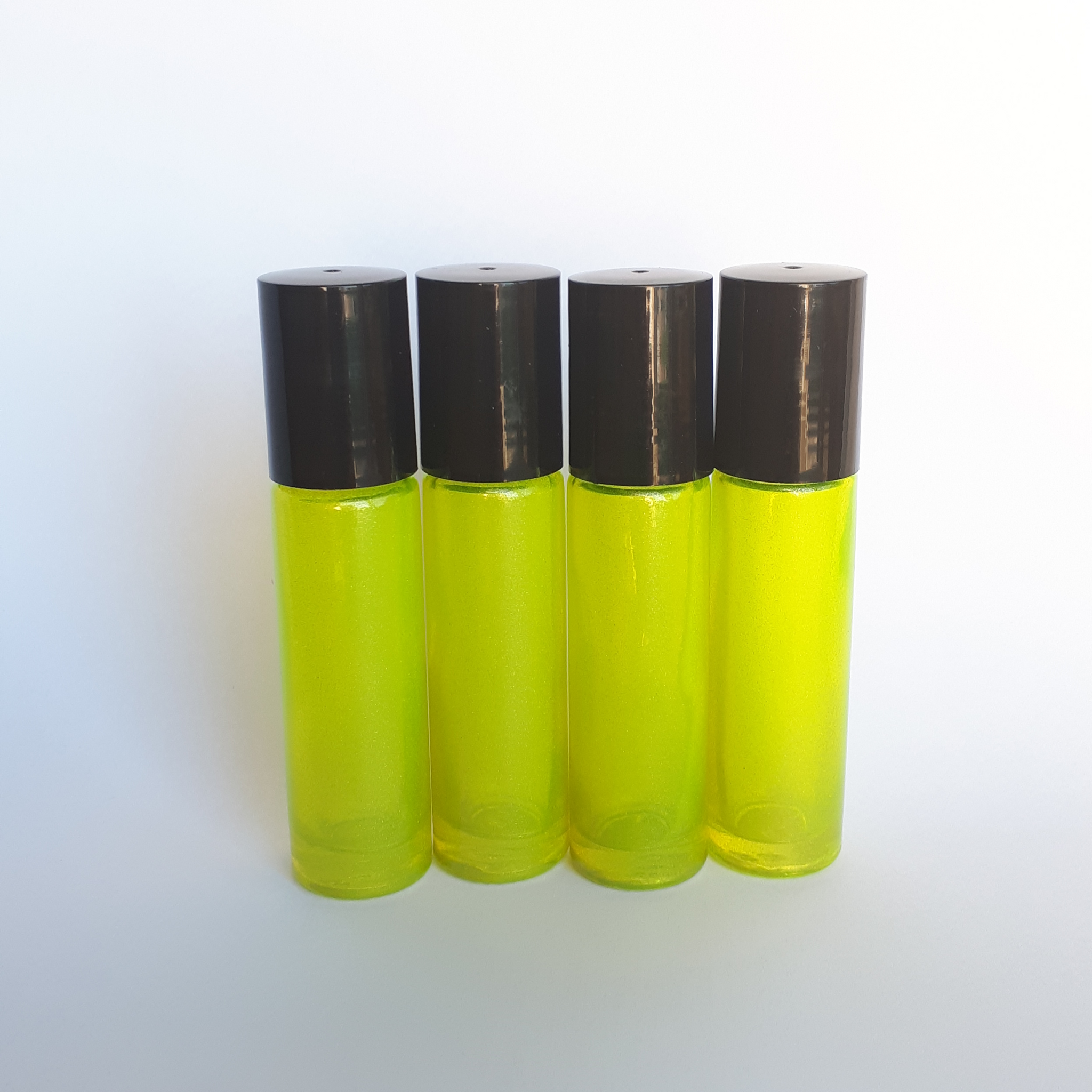 Download 10ml Yellow Roller Bottle With Plastic Roller 4pack Oil Jenneration Yellowimages Mockups