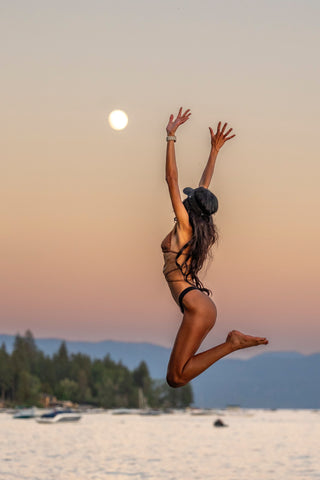 woman in a skin tone swimsuit