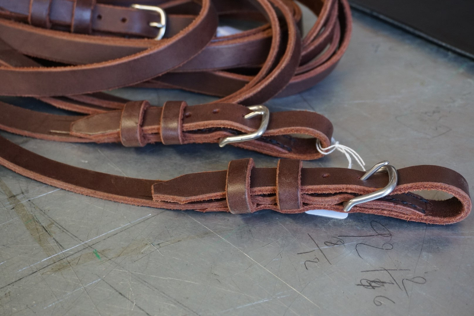 Bridle reins in full grain saddle leather made by Bourrellerie Collin