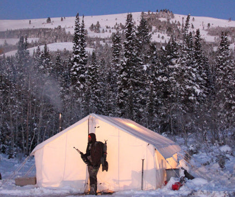 Tent with Hunter Standing in Front