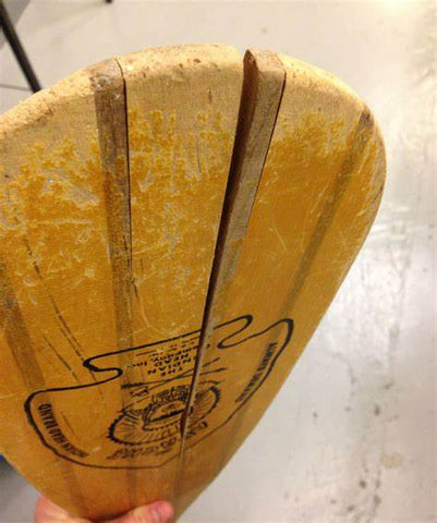 cracked laminated canoe paddle