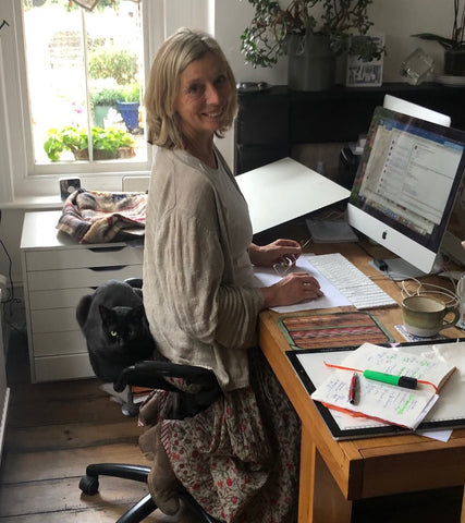 Julia Gash British Map Illustrator and Travel Artist at home in her design studio