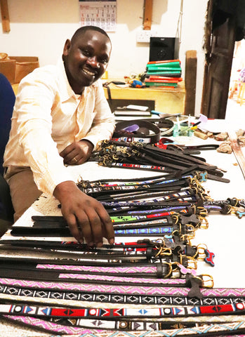 The production manager at Zinj Design checking the quality of the latest batch of dog collars