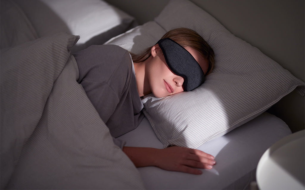 Woman sleeping with Eye Mask