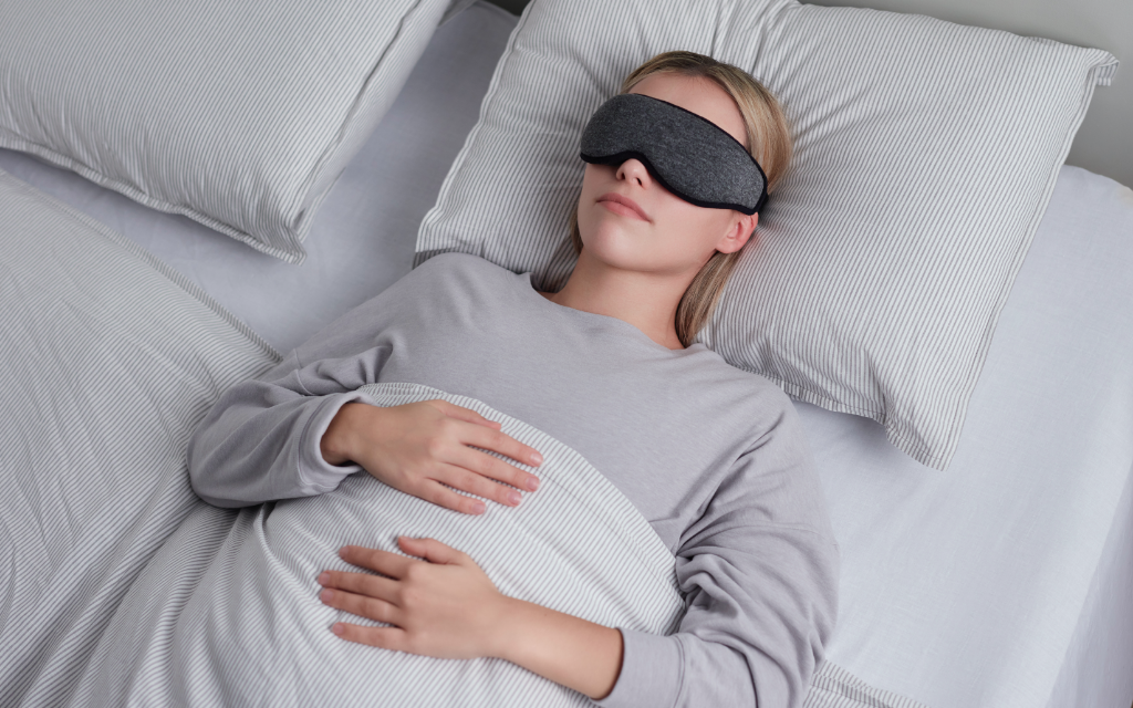 Woman sleeping with Eye Mask