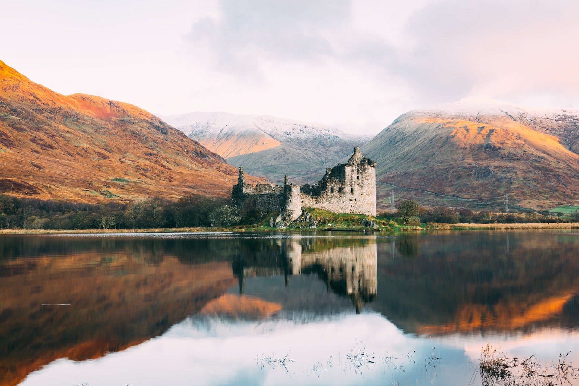 Castle over lake in Scotland