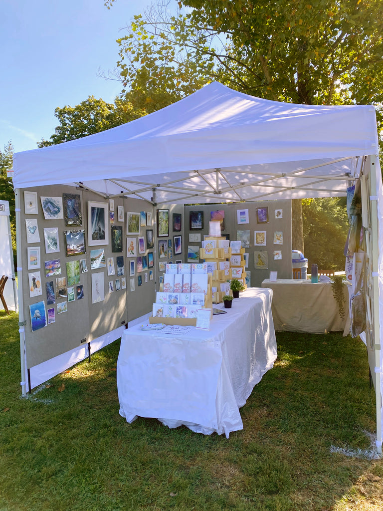 An outdoor booth shot of my art tent