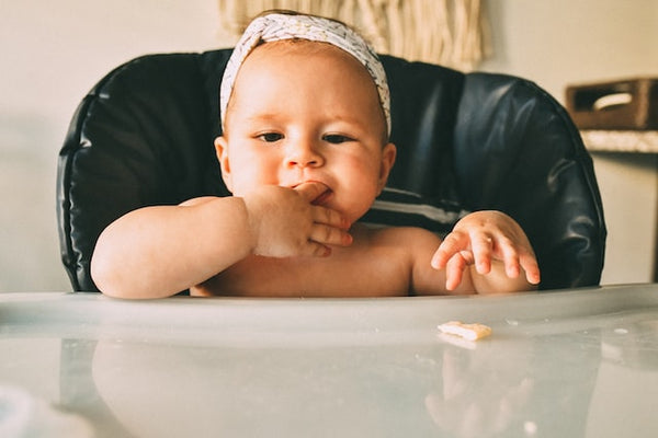 happy baby toddler eating food