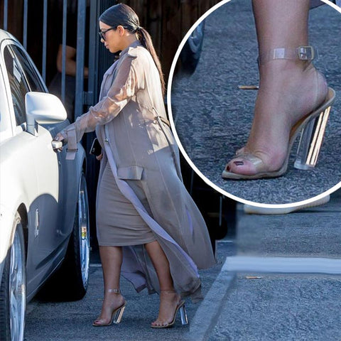 Kim Kardashian wobbling in her perspex block heels
