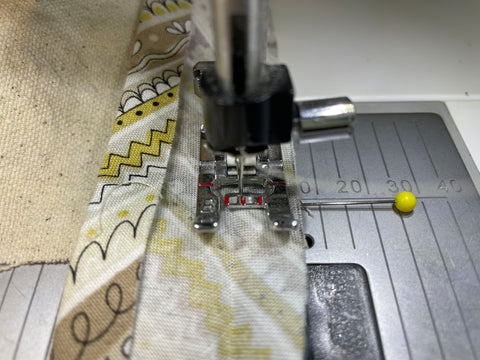 sewing bias tape to apron