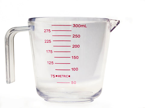 A clear measuring jug, measuring up to 300ml